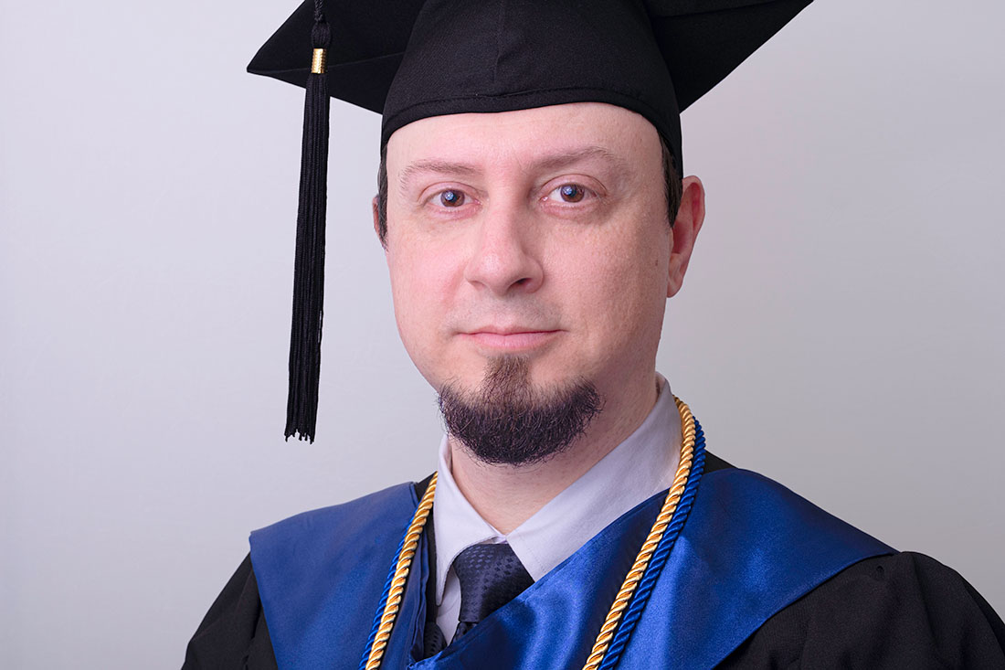 Tiziano Caviglia con la toga e il tocco Michigan University by Tiziano L. U. Caviglia